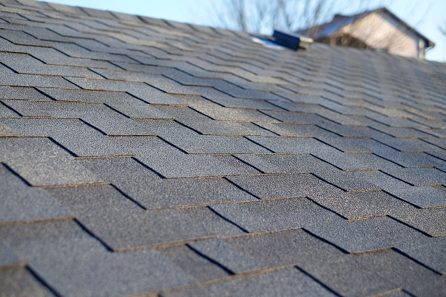Bitumen Tile Roof. Roof Shingles - Roofing. Close Up View On Asp