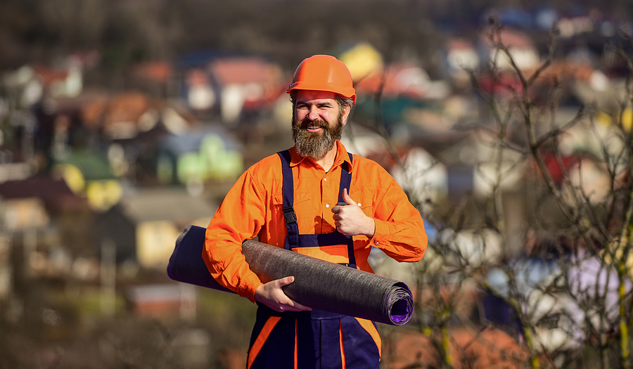 Roofer contractor giving thumbs up after final inspection